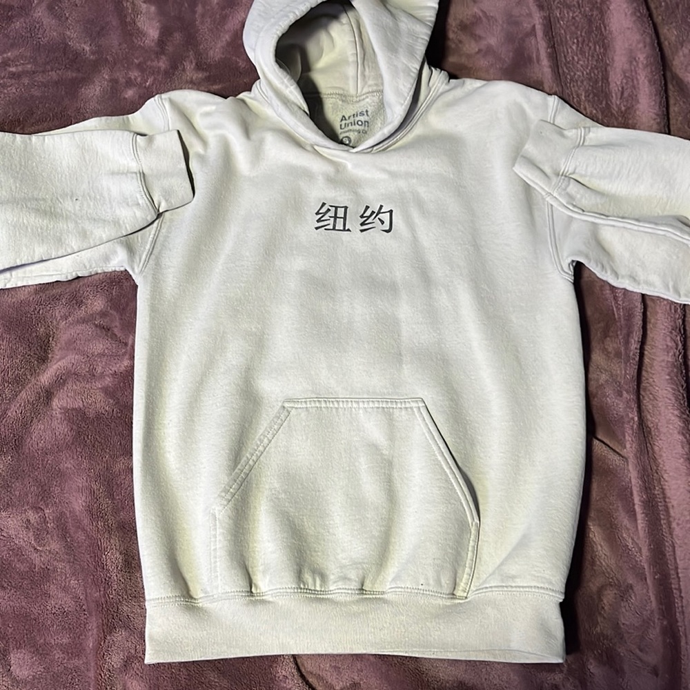 like new crewneck hoodie very unnoticeable stain on back no tears